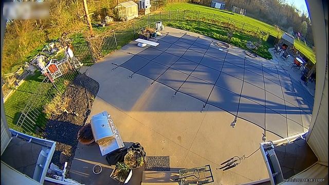 Woman Steps on Pool Cover and Falls While Moving Heavy Garden Furniture - 1505714 смотреть онлайн