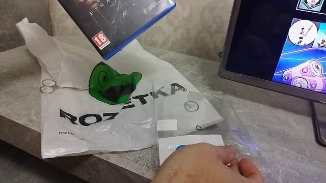 Распаковка диска с игрой Death Stranding для PS4 (Blu-ray диск, Russian version) от магазина Розетк смотреть онлайн