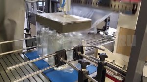 Термоупаковочная машина ТМ 1А ПП. Упаковка стеклянных бутылок  0.5л. Группа 4х3 на плоской подложке