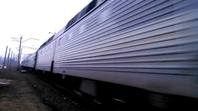 Электровоз ЧС7-182 c фирменным скорым поездом "Промiнь" смотреть онлайн