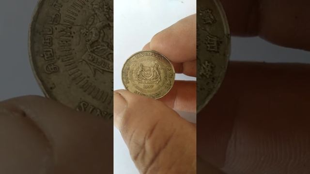 Singapore 50 cent 1997 error coin смотреть онлайн