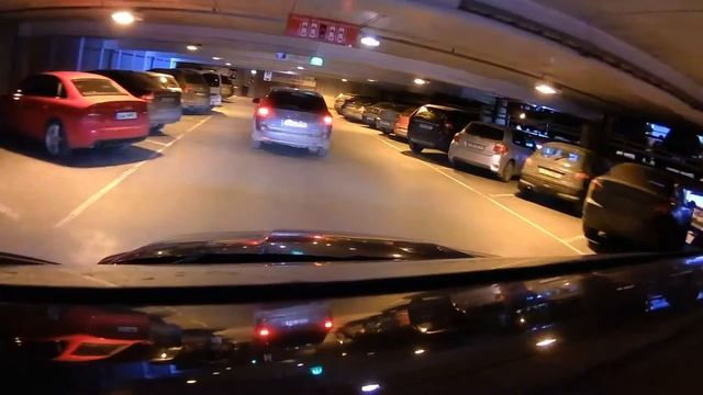 Driving into Stockmann parking house in Tallinn, Estonia смотреть онлайн