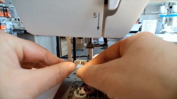 How to use the Janome Sewist 725S  Needle Threader