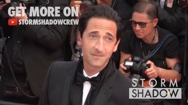 Lara Lieto and Adrien Brody on the red carpet for the 70th Anniversary of the Cannes Film Festival.