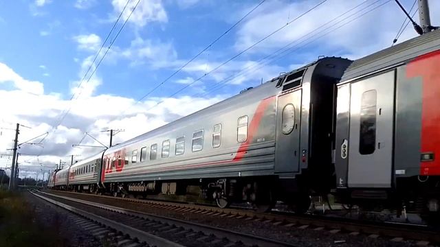 ЭП1-050. Идёт с пассажирским поездом "Арктика" с юга. Голиковка. Петрозаводск. смотреть онлайн