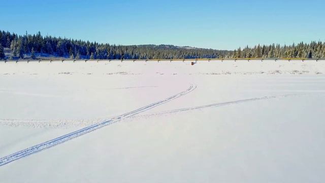 Free Stock Videos – aeria drone footage of frozen river and snowed bridge in Alaska смотреть онлайн
