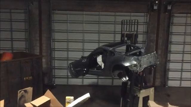 Nissan 350z gets dropped in a dumpster from 15 ft!!! смотреть онлайн