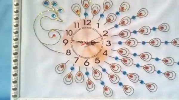 Часы Павлин