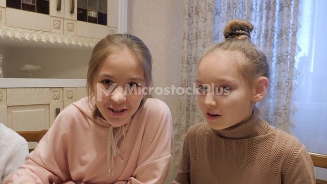 Happy Girl Teenagers Eating On Home Kitchen And Talking Front Camera. Smiling Girl Turning Off Vide