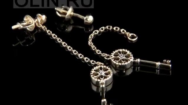 Сережки с бриллиантовой подвеской "Ключ" смотреть онлайн