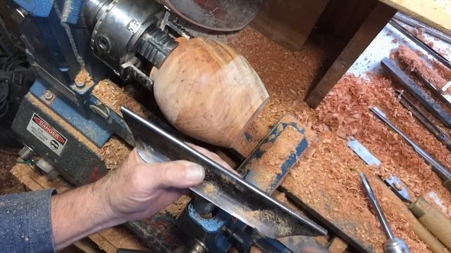 Richard Raffan Turns And Burns An Ironbark Pot Made From Sawmill Waste.