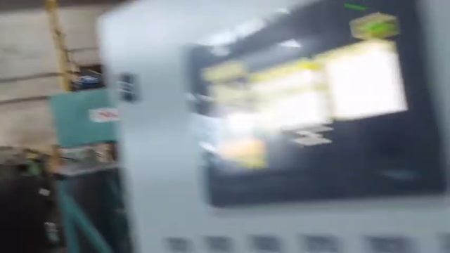 Автоматический вертикальный станок с подвижным порталом. смотреть онлайн