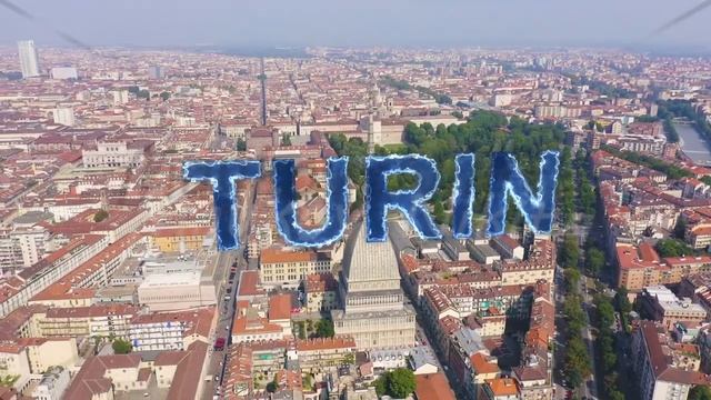 Inscription on video. Turin, Italy. Flight over the city. Mole Antonelliana - a 19th-century buildi смотреть онлайн