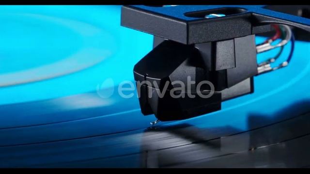 Tonearm Headshell on Spinning Vinyl Record in Neon Lights / Videohive, Stock footage, Technology смотреть онлайн