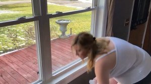 No Bra cleaning my windows