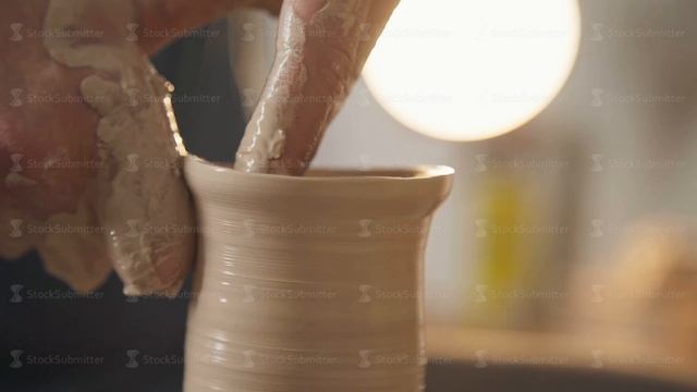 The Potter's Work Using A Spinning Potter's Wheel. Only Hands