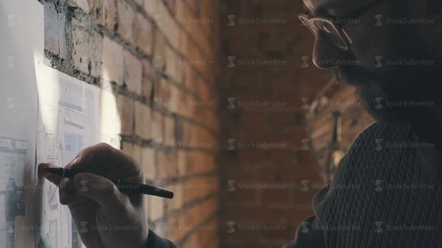 Drawings and diagram of future buildings on the wall, blueprints