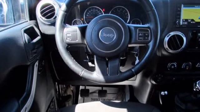 2014 Jeep Wrangler Unlimited Sahara 4WD (Milton, Ontario) смотреть онлайн