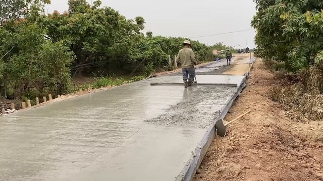 Concrete Road Construction Technology With Concrete Mixer Truck And Trucks - Construction Works