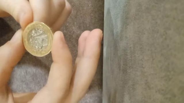 разбор монеты Британии ONE POUND