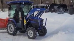 Уборка снега трактором Kubota Farmtrac 26