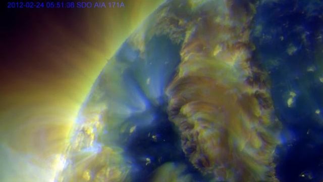 SDO - Filament Eruption - 2012-02-24 00:00 to 12:00 - AIA 211Å, 193Å, and 171Å Composite - HD смотреть онлайн