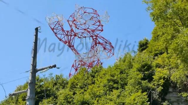 Transmission tower - Snow Leopard. Sochi, Russia. 4K