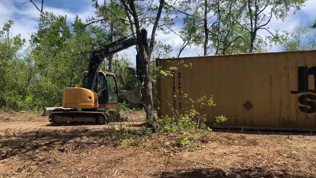 Excavator dragging 40’ shipping container смотреть онлайн