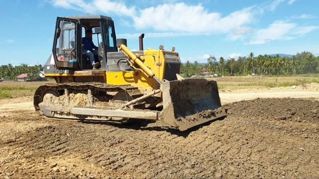 Bulldozers Level the Sand Soil in Toll Road Construction смотреть онлайн
