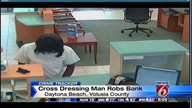 Cross-dressing Man Sought In Bank Robbery