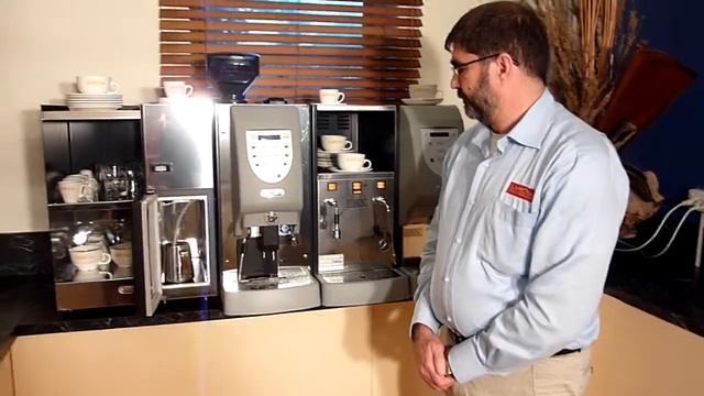 Cleaning the Foaming device on the Carimali Multi Automatic Coffee machine смотреть онлайн
