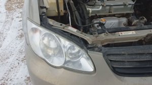 Замена лампочки (H7) ближнего света в автомобиле BYD F3 (Toyota Corolla E120) 2011г