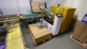 Паллетизация одновременно четырёх коробов коллаборативным роботом