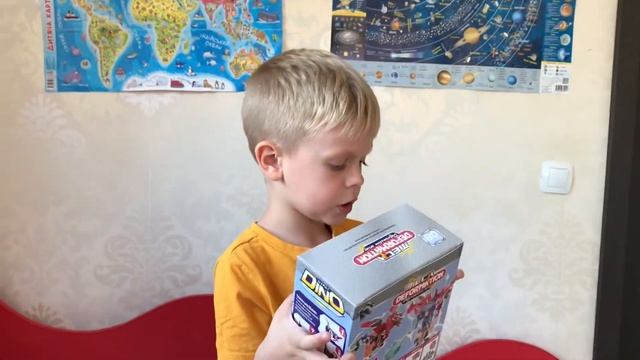 Распаковка робота трансформера Deformation Dino Toy смотреть онлайн