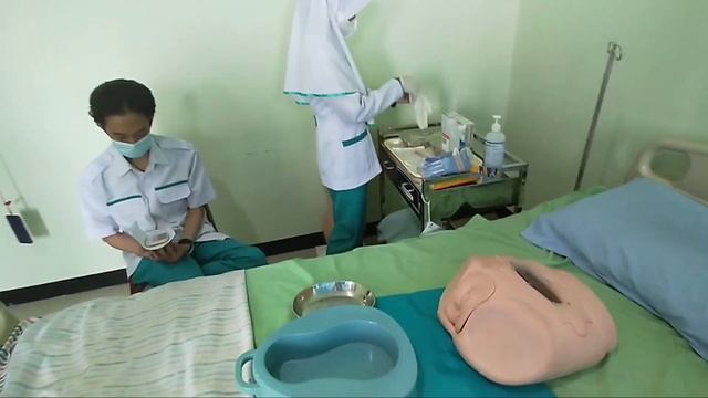 Prosedur Enema /Rectal Wash Out(Kelompok 14, Semester 4, Tk. 2B)