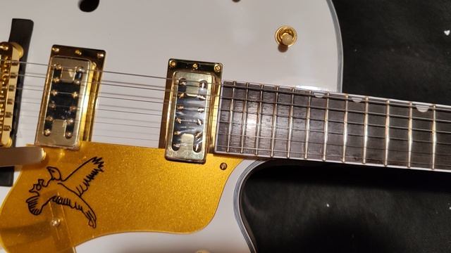 Обзор сборки китайской реплики Gretsch Falcon белый с новой фабрики смотреть онлайн