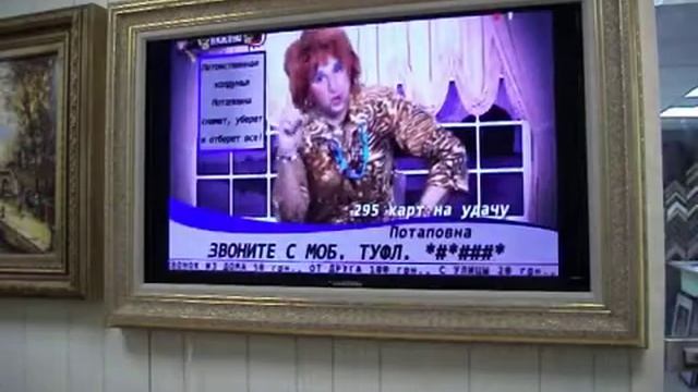 Маскировка телевизора картиной