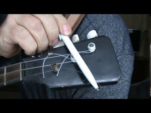 Как закрепить струны и ремень на балалайке