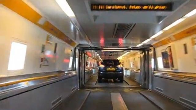 Driving on to the shuttle in Calais to cross the Channel by eurotunnel (compressed version) смотреть онлайн