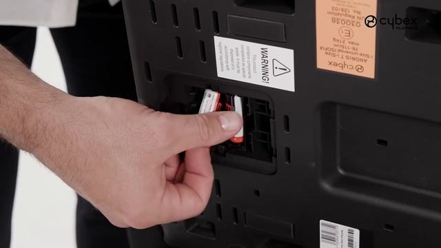 Как поменять батарейки в автокресле Anoris T i-Size CYBEX