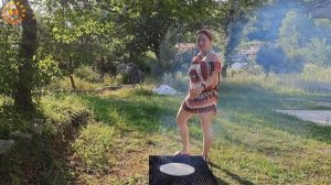 Cooking meat on the fire. Original and tasty. Kitchen show. Cooking show. Mila naturist.