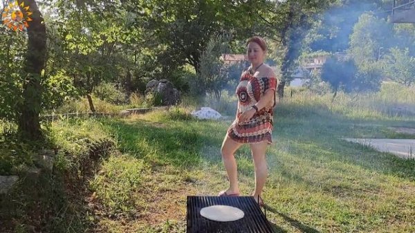 Cooking meat on the fire. Original and tasty. Kitchen show. Cooking show. Mila naturist.