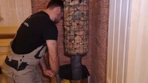 Облицовка металлической печи Ферингер ламелями.