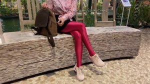 Anna in pink shiny spandex pantyhose walking in shopping mall