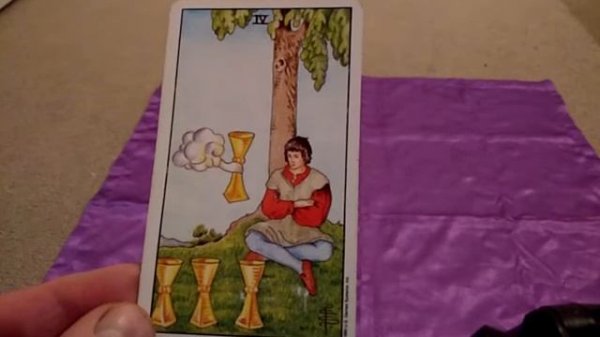 Four of cups Tarot card meaning.