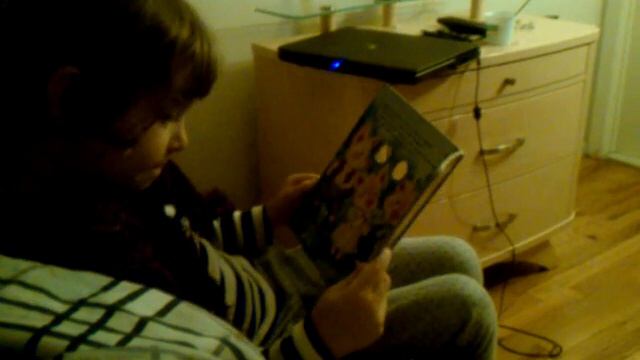 Milana Is Reading Her Book