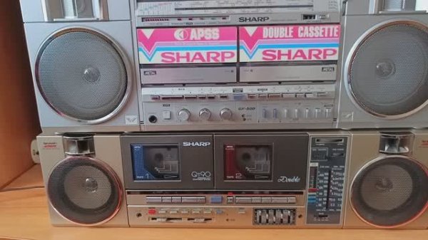 СРАВНИЛ Sharp Qt-90 и Sharp Gf-500