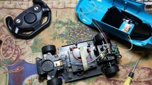 Ремонт двух машинок с пультом управления.