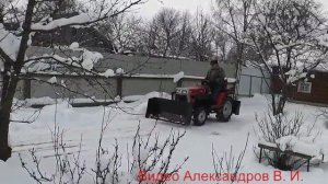 Убираю снег на МТ 180.