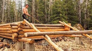 Как поднять тяжелые бревна на бревенчатой хижине с помощью простых инструментов